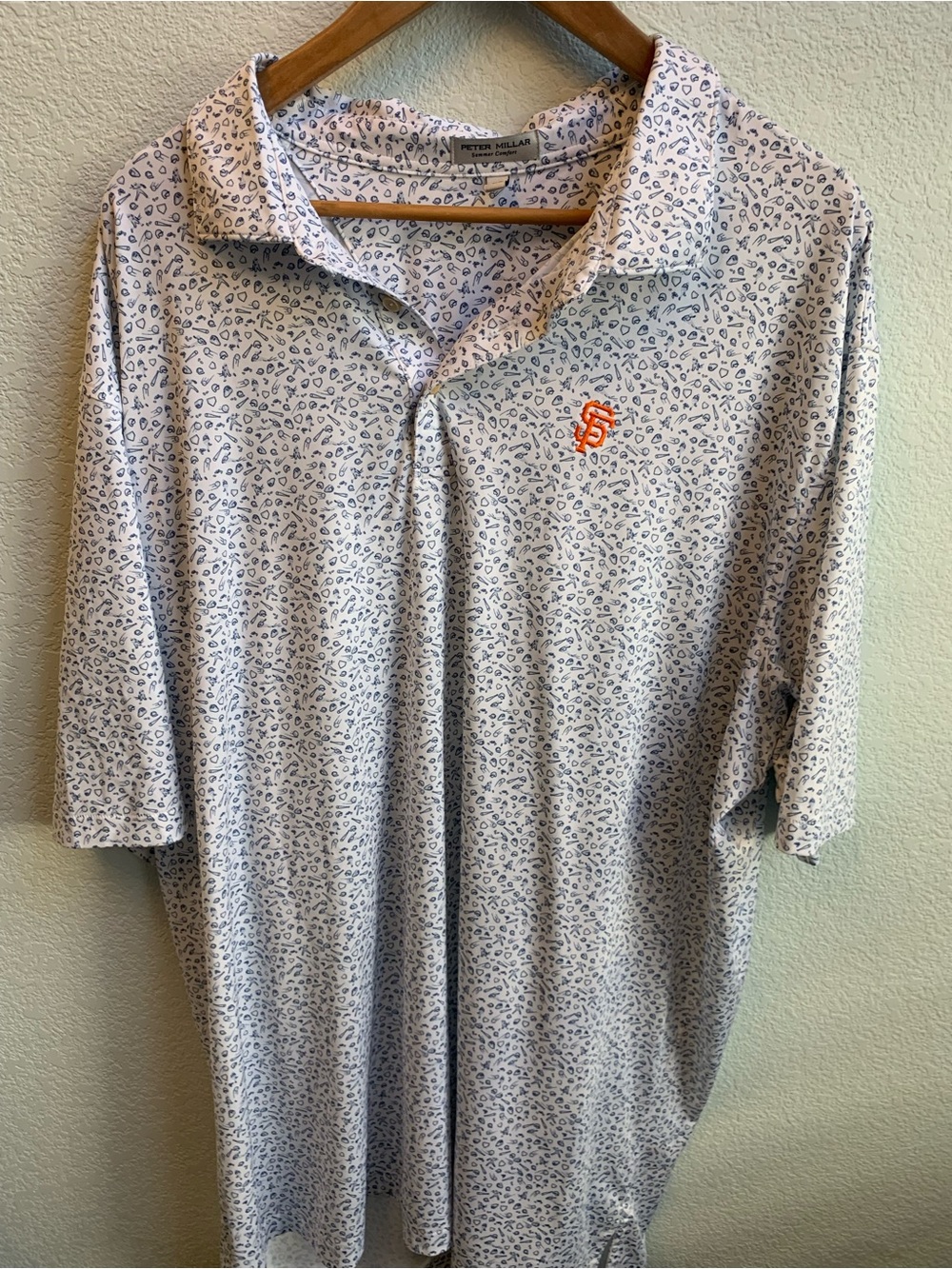 Peter Millar Light Gray Polo with Navy Print and Orange Logo